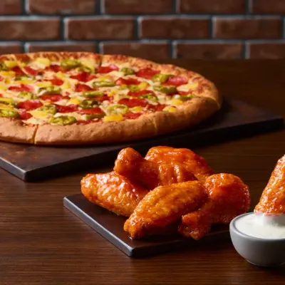 Nose Creek Pizza signature dishes - Fresh pizza, wings, pasta and burgers in Coventry Hills Calgary